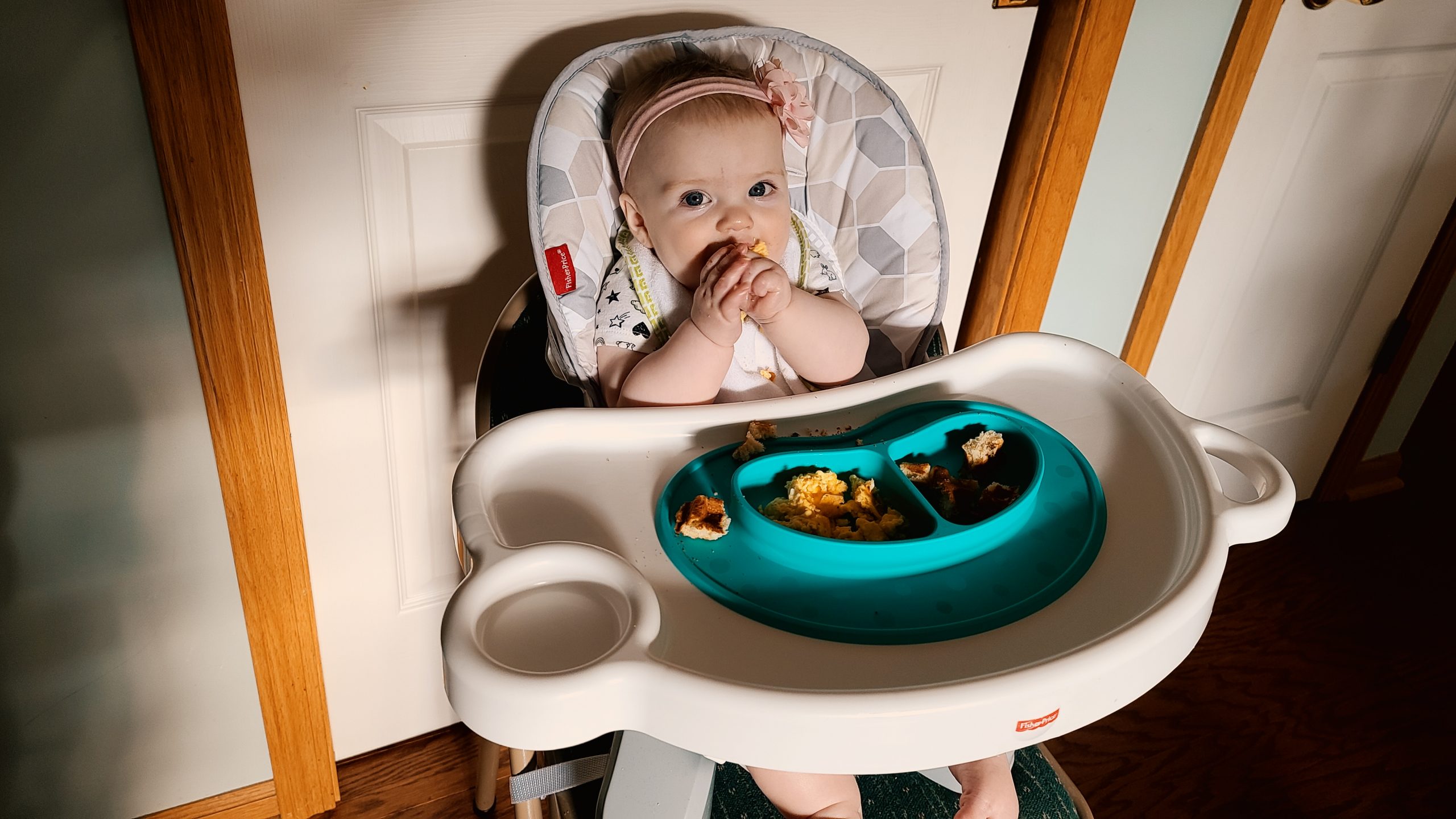 Baby using baby led weaning