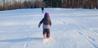 Child Running in the Snow