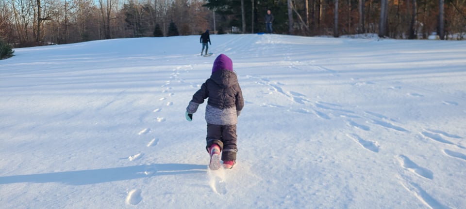 Child Running in the Snow