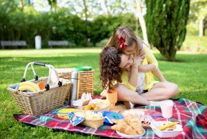 children on a picnic blanket