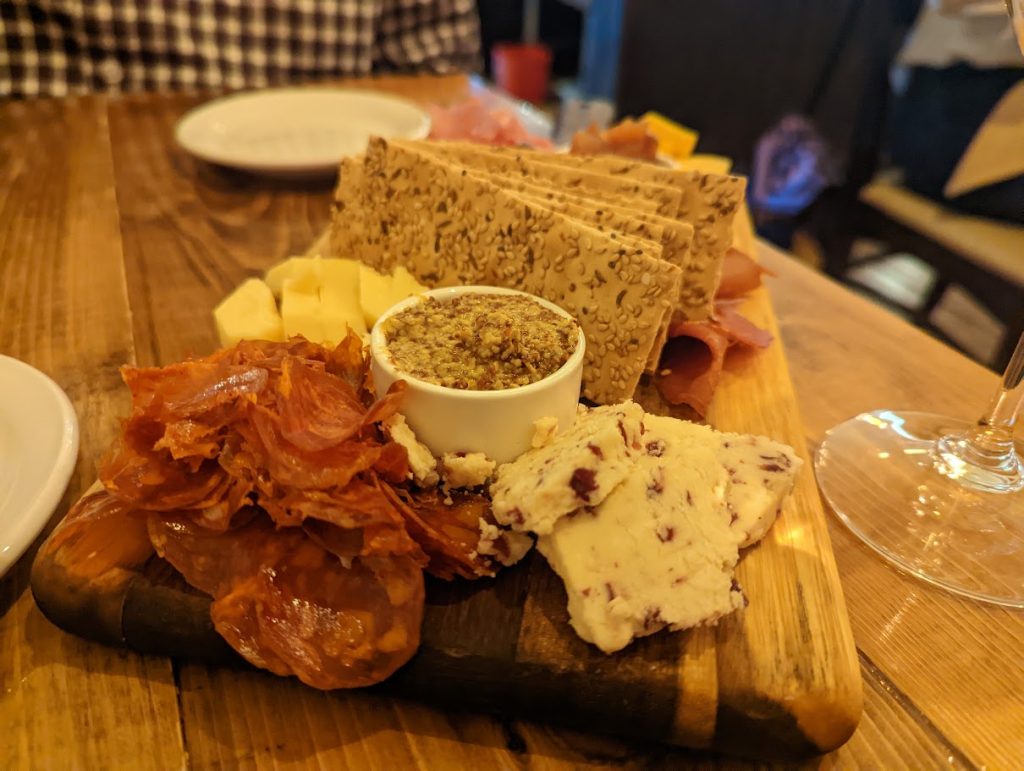 A photo of a charcuterie board. 